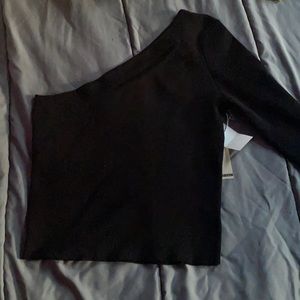Black one shoulder top. New with tags.